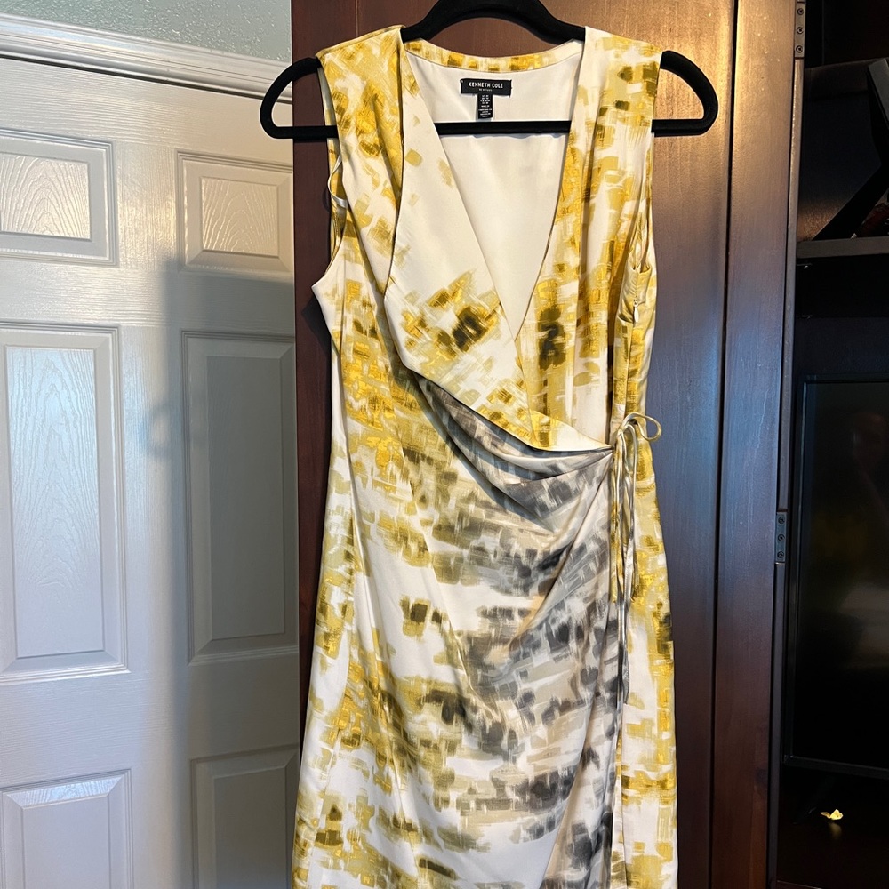 Kenneth Cole wrap styled beautiful dress with side zipper.